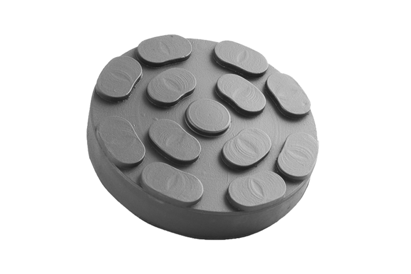 Front view of a black, round rubber pad (item no. 047021850) for vehicle lifts, with a rubber lip for slipping over the lift arm.