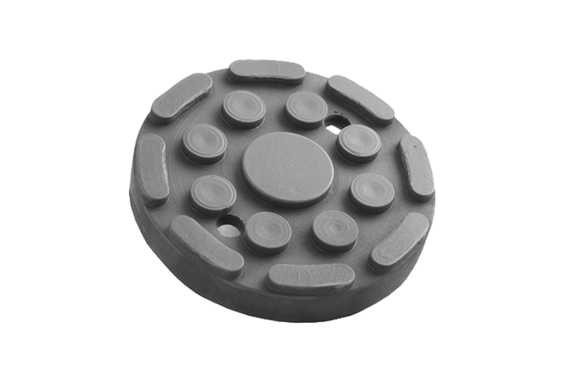 Front view of a black, round rubber pad (item no. 115172024) for vehicle lifts, with two holes and rubber lip for slipping over and bolting to the lift arm.