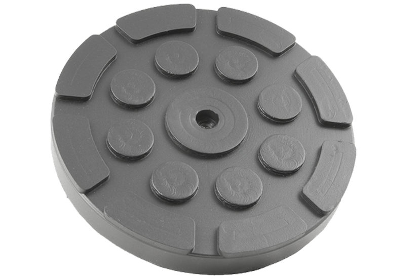 Front view of a black, round rubber pad (item no. 169130) for vehicle lifts, with central hole, rubber lip for slipping over, and bolting to the lift arm.