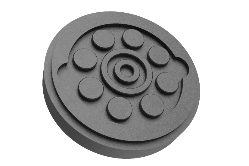 Front view of a black, round rubber pad with a rubber lip for slipping over the lift arm.
