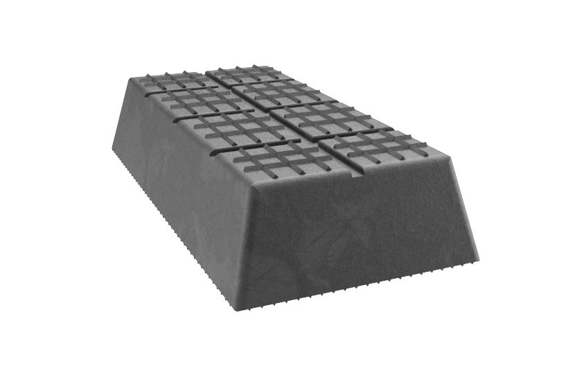 Front view of a black, rectangular rubber block (item number 38.31.829) for vehicle lifts, with grid pattern and groove on the surface.