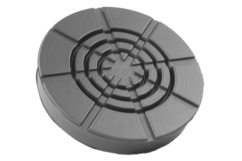 Front view of a black, round rubber pad (item no. AC-GS1) for vehicle lifts.