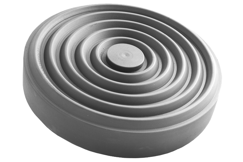 Front view of a black, round rubber pad (item no. BRADBURY001) for vehicle lifts, with rubber lip for slipping over the lift arm.