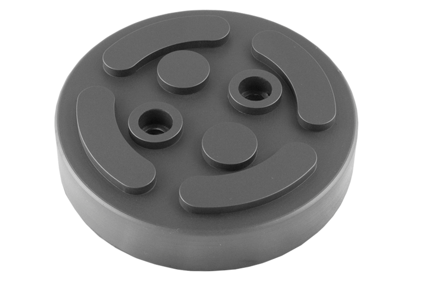 Front view of a black, round rubber pad (item no. GTCN004) for vehicle lifts, with two holes, rubber lip for slipping over, and bolting to the lift arm.