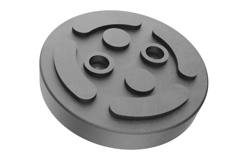 Front view of the rubber pad (item no. GTCN009) for lifts – black, round, with two holes for bolting, flexible rubber lip for slipping over the lift arm and additional fixation.