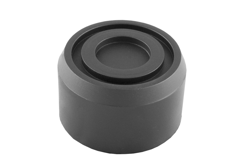 Front view of item WERTHER001-B1007, a round black rubber pad for vehicle lifts with a central hole, rubber lip for slip-on mounting and screw-on fastening to the lifting plate.
